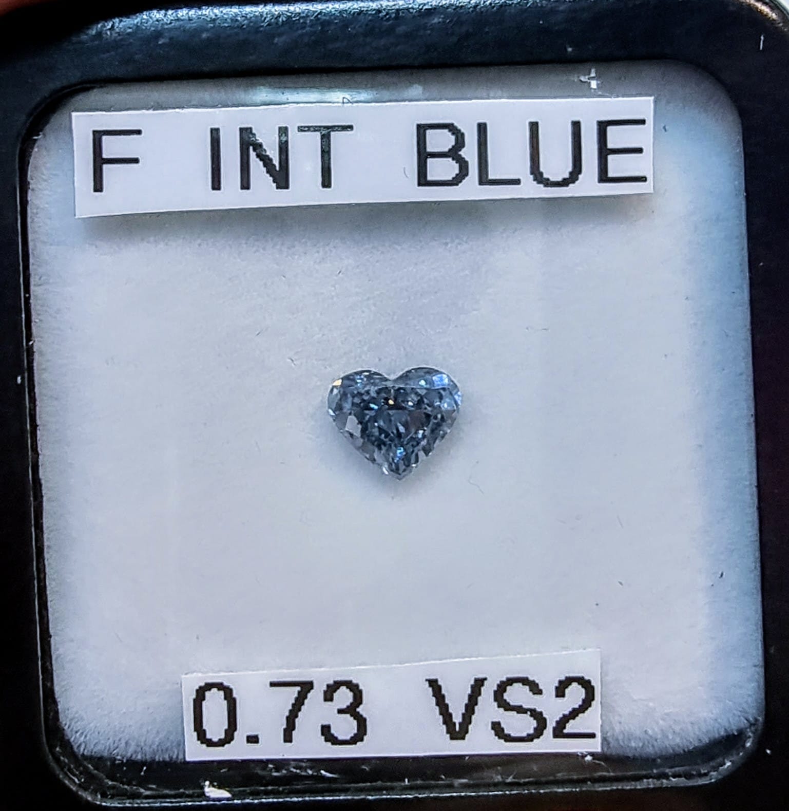 0.73ct, VS2, Fancy Intense Blue diamond cut in heart shape. 